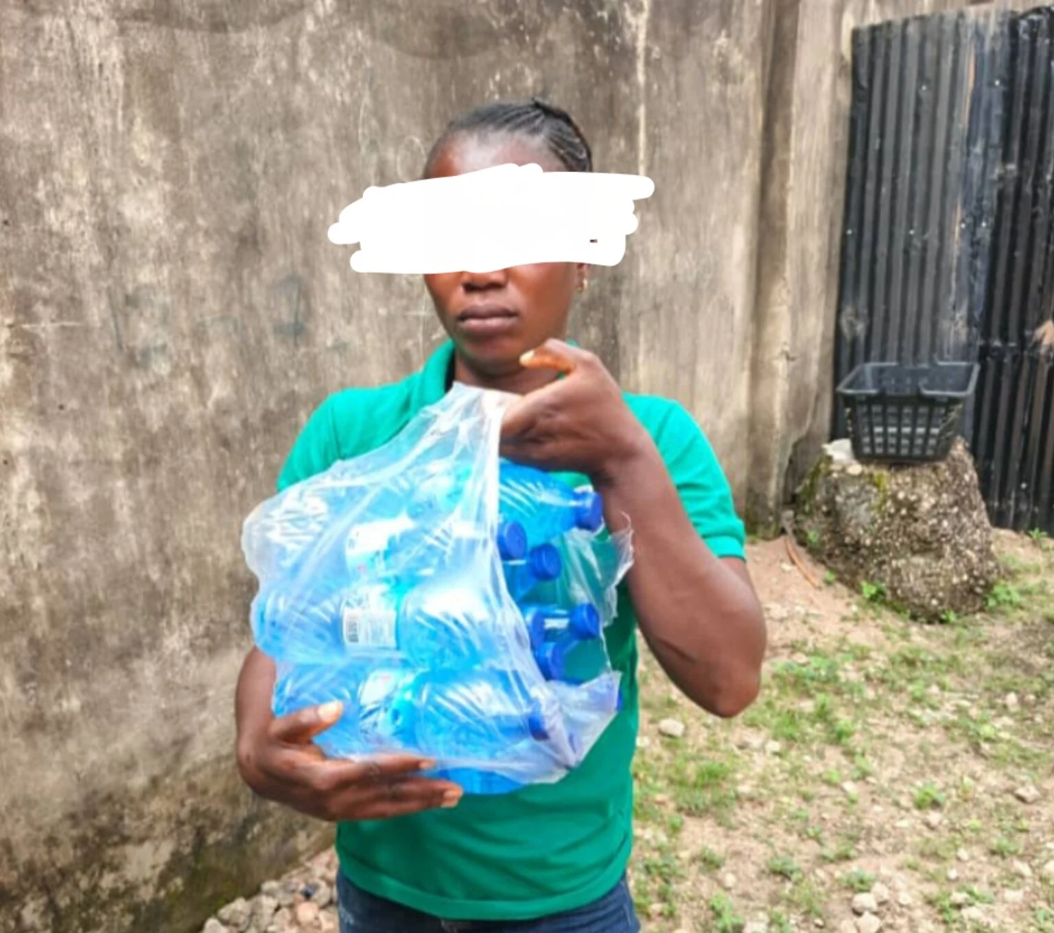 Woman caught smuggling alcohol disguised as bottled water to inmate in Ogun